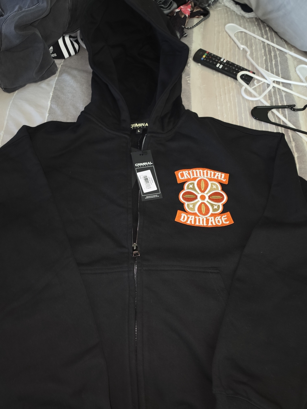 Criminal Damage Men’s Black Zip-Up Hoodie with Orange Logo